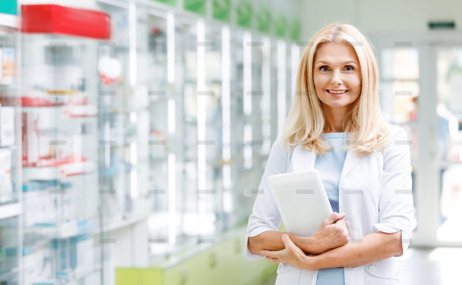 demo-attachment-1175-cheerful-pharmacist-holding-digital-tablet-and-smi-98L5GF6-1